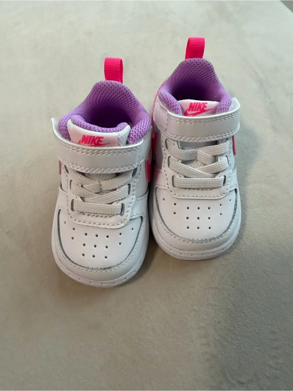 Nike Toddler White Sneakers with Pink & Purple Accents